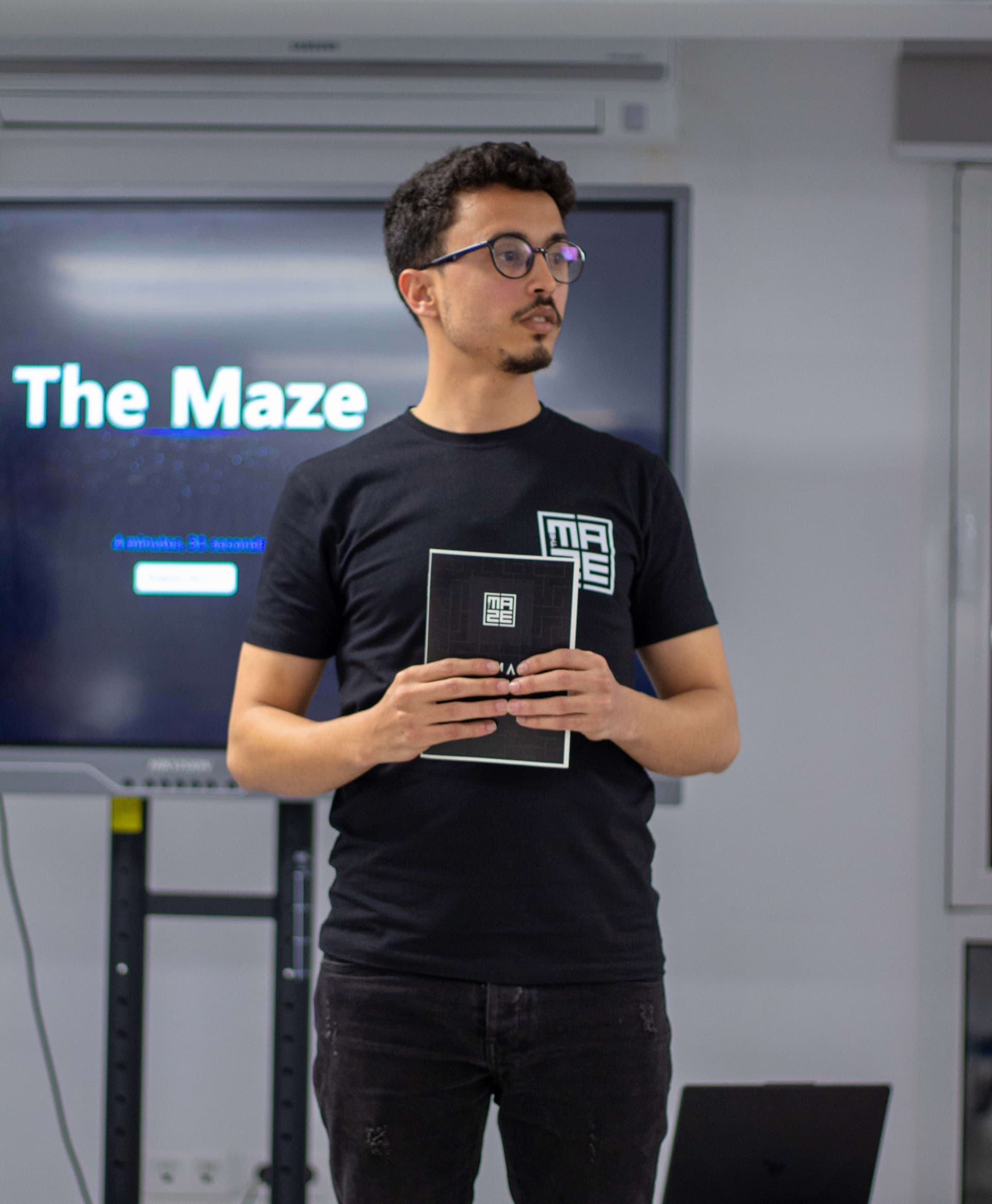 Malek khannoussi get rewards for winning a hackathon between universities in tunisia